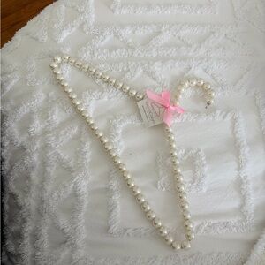 Elegant Pearl Necklace with Pink Bow